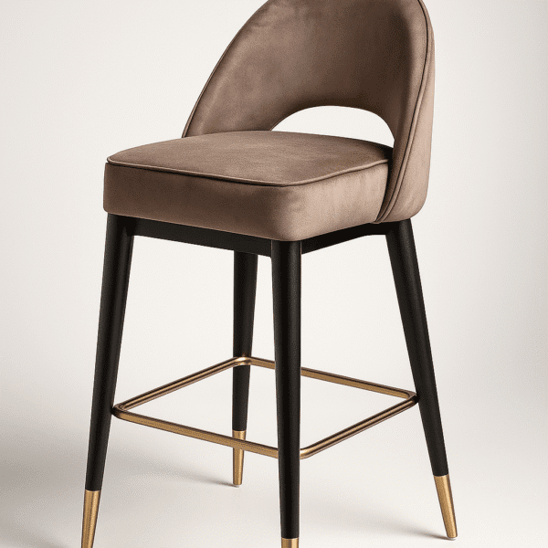 Luxurious mocha-colored bar chair with cushioned seating, gold-tipped black legs, and a gleaming footrest — the Mocha Bar Chair by BOSQUE.