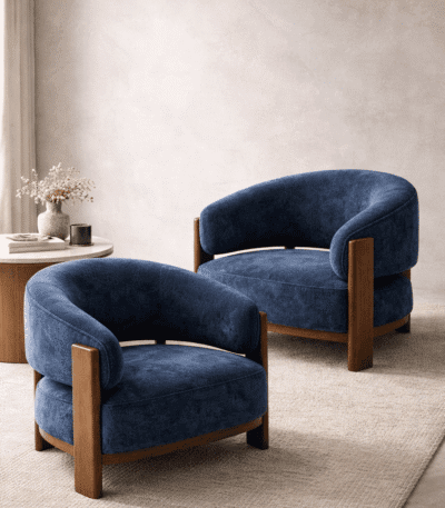 Modern blue upholstered barrel lounge chair with curved back and solid wood legs for luxury living room