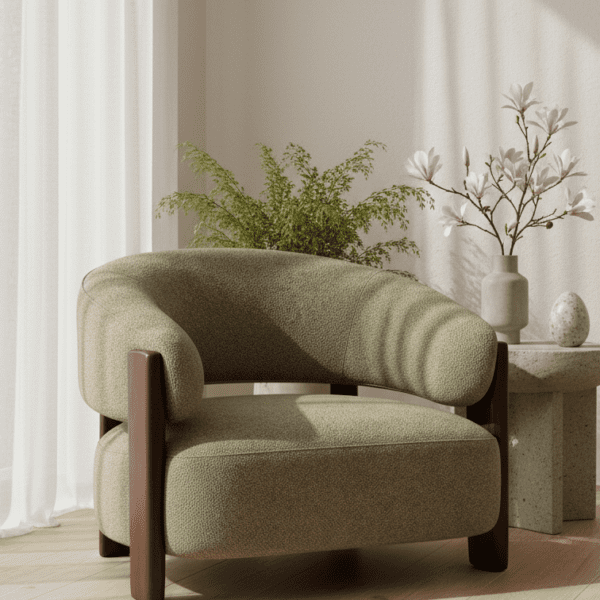 Sage green boucle armchair with walnut wood frame in a minimalist living room with sheer curtains and floral arrangement
